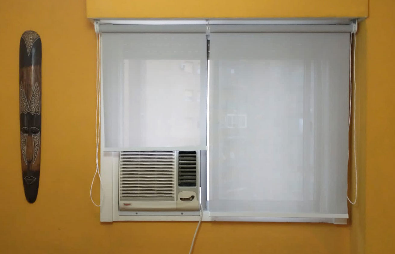 Cortina screen a la medida del aire acondicionado.